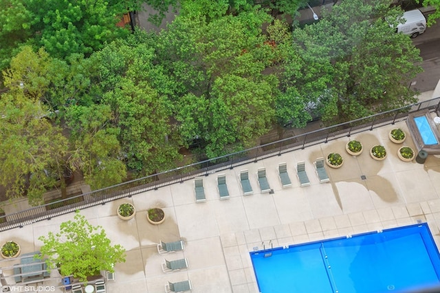 view of pool with fence