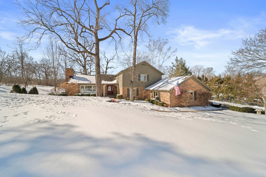 20938 N Buffalo Run, Kildeer, IL 60047 - view of front of home featuring a chimney and brick siding