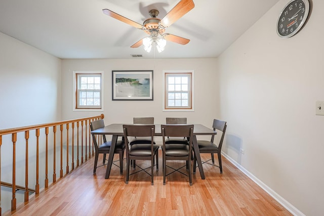 dining room featuring ceiling fan and light wood-type flooring