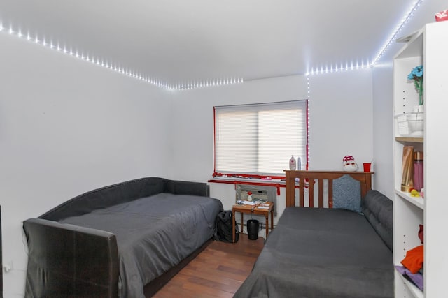 bedroom featuring hardwood / wood-style floors