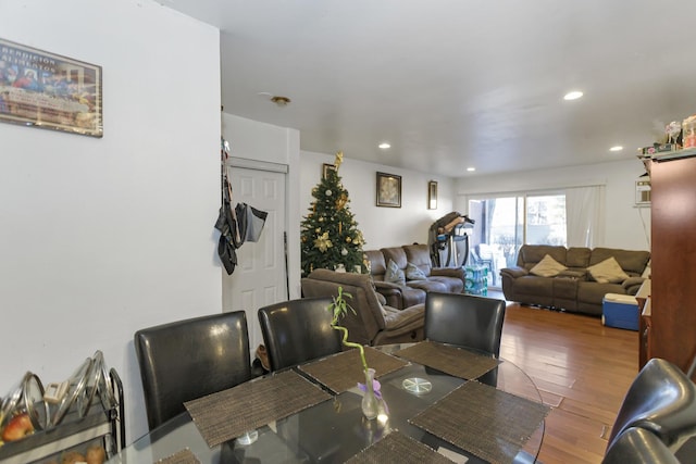 dining space featuring hardwood / wood-style flooring