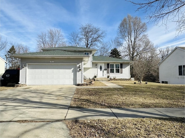 ranch-style home with a garage and a front yard