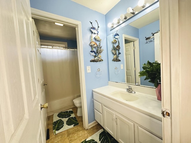 full bathroom with vanity, toilet, and shower / bath combo