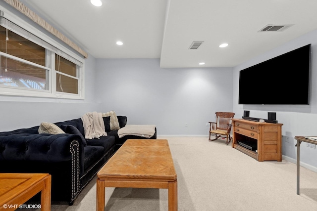 living room featuring light carpet