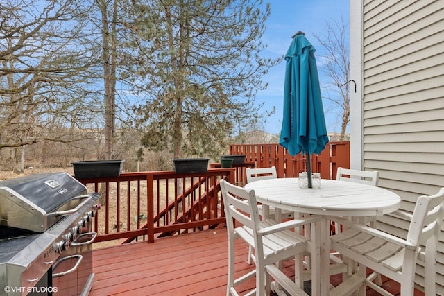 wooden deck featuring grilling area