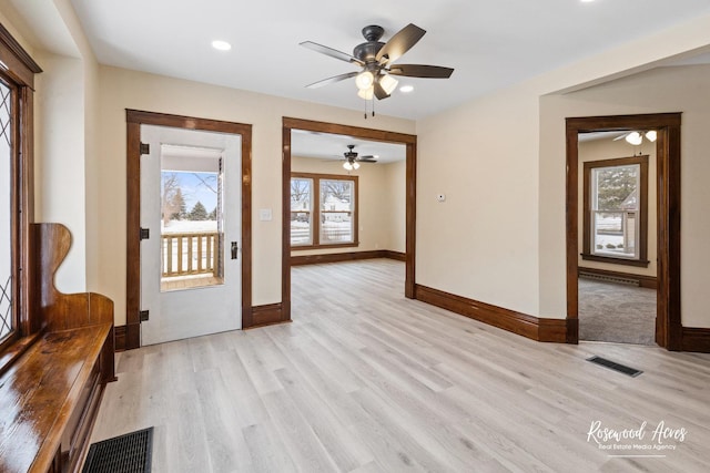 foyer entrance featuring light hardwood / wood-style flooring