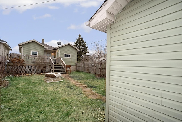 view of yard with a deck