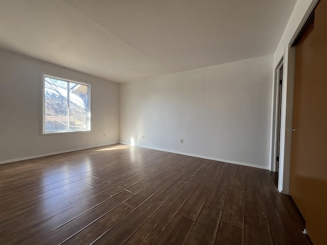 empty room featuring dark hardwood / wood-style floors