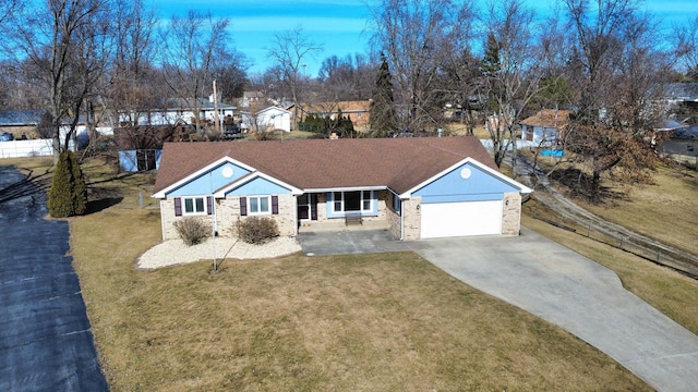 single story home with a garage and a front yard