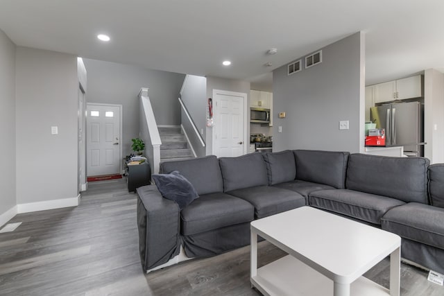 living room with dark wood-type flooring