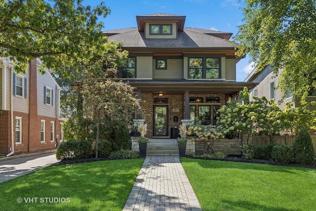 view of front of property featuring a front yard