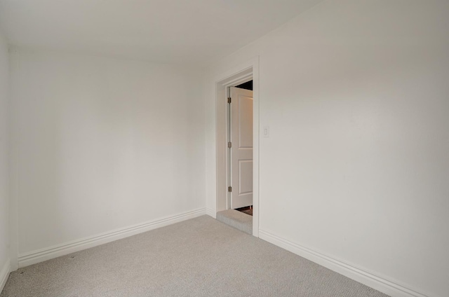 unfurnished room with carpet floors