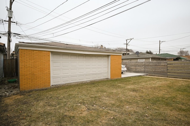 garage with a yard