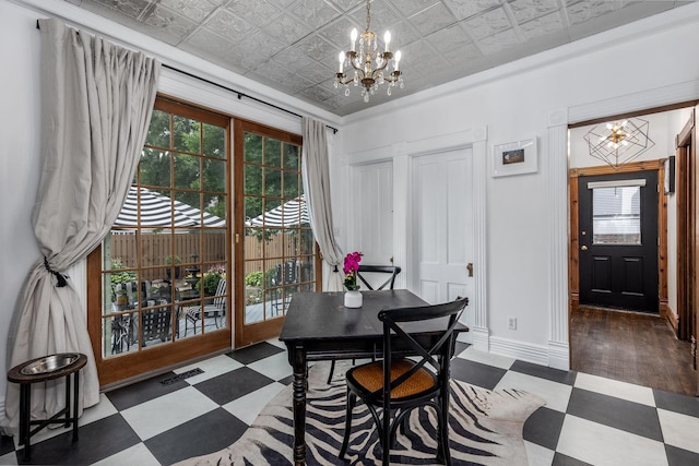 dining space featuring a chandelier