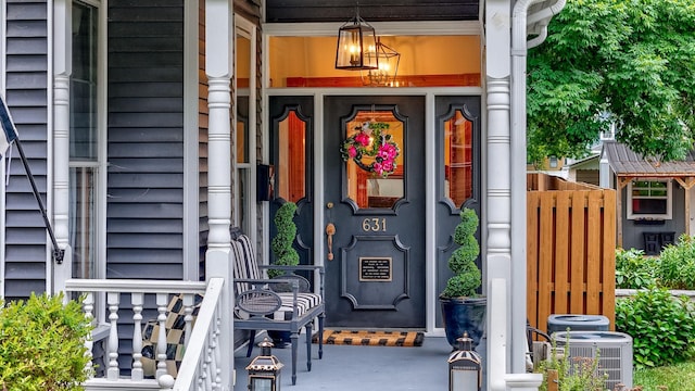 doorway to property featuring central AC