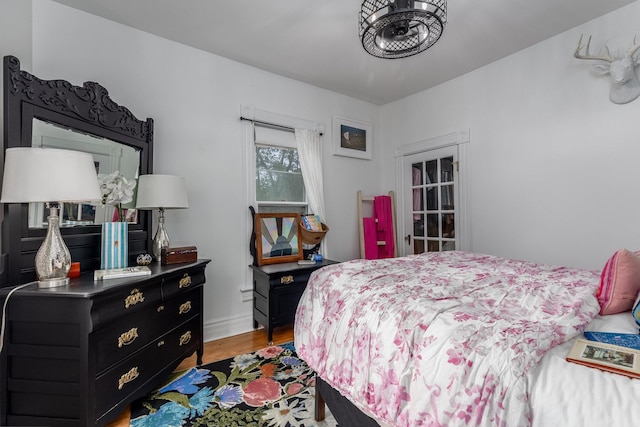 bedroom with light wood-type flooring