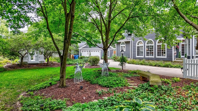 view of yard featuring a garage