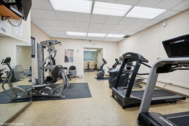 gym with a drop ceiling