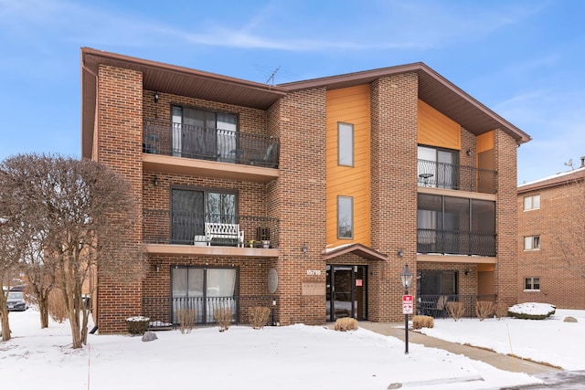 view of snow covered property