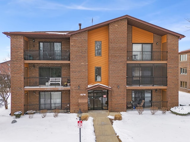 view of snow covered property