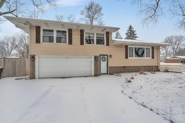 split level home with a garage