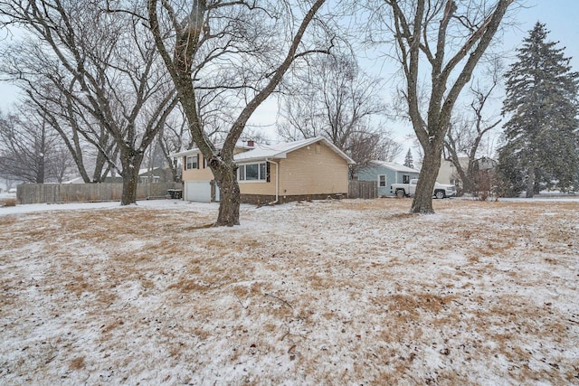 view of yard with a garage