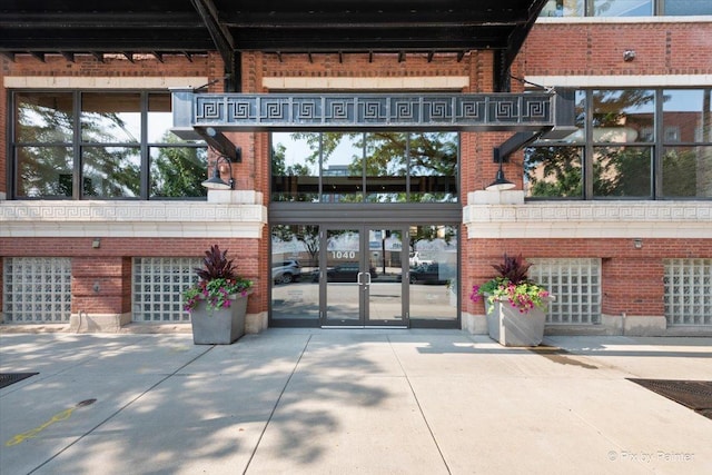 property entrance featuring french doors