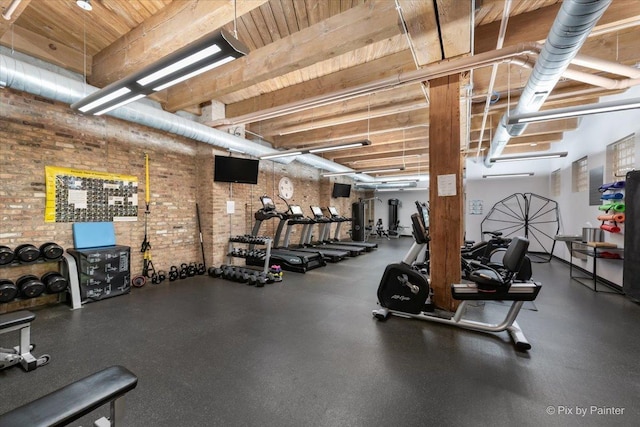 workout area with brick wall