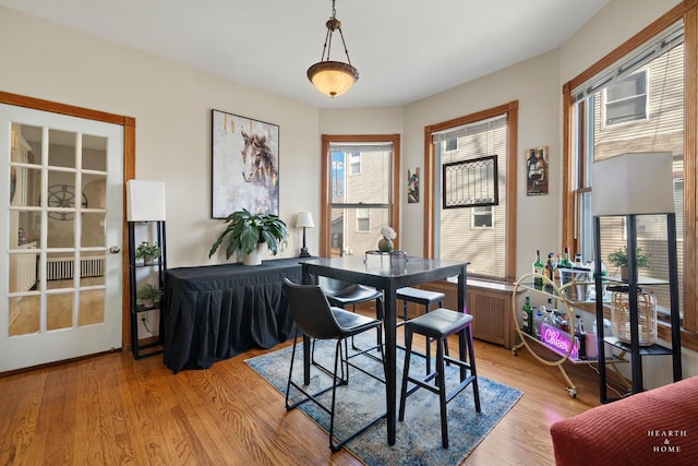 dining space featuring light hardwood / wood-style flooring