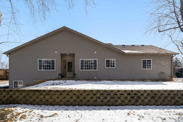 view of snow covered house