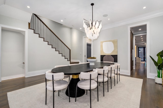 dining room with recessed lighting, stairway, baseboards, and wood finished floors