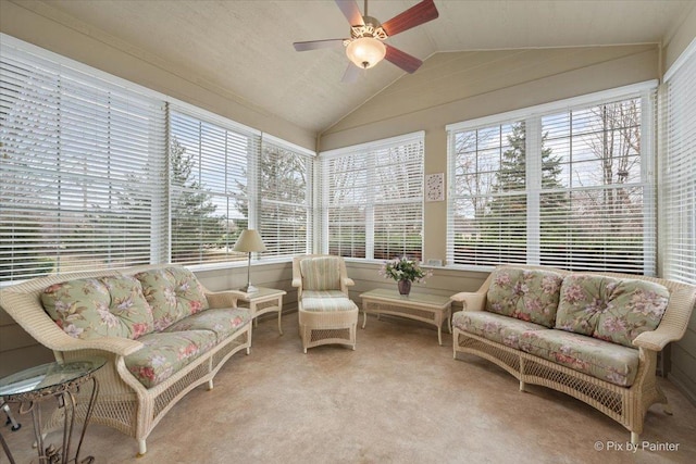 sunroom featuring carpet and vaulted ceiling