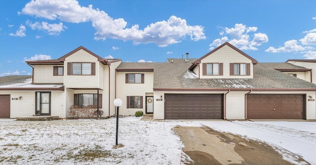 view of front of property with a garage