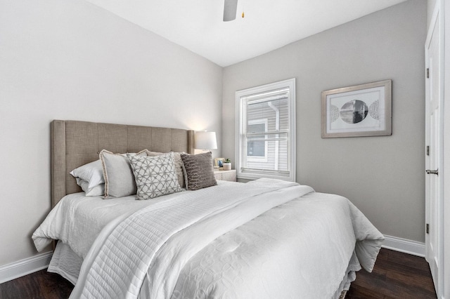 bedroom featuring dark wood-type flooring and ceiling fan