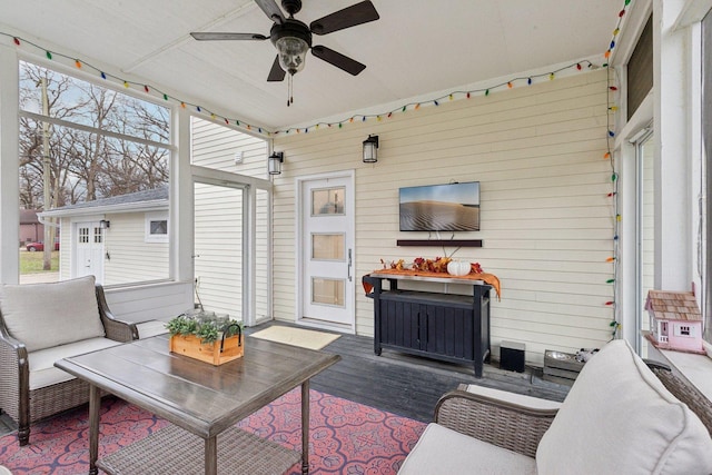 view of patio featuring an outdoor living space and ceiling fan