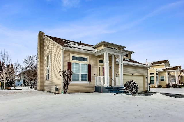 view of front of home with a garage