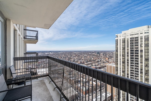 balcony featuring a view of city