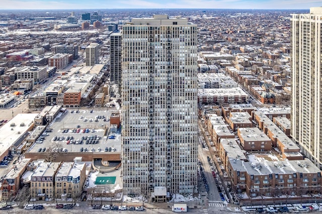 birds eye view of property featuring a city view