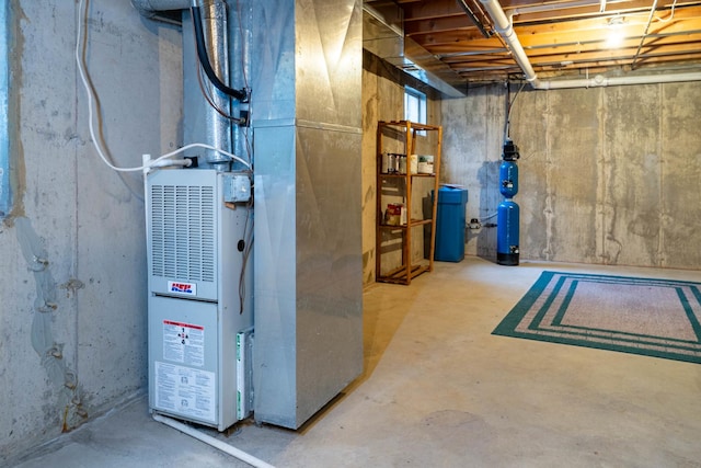 basement featuring heating unit