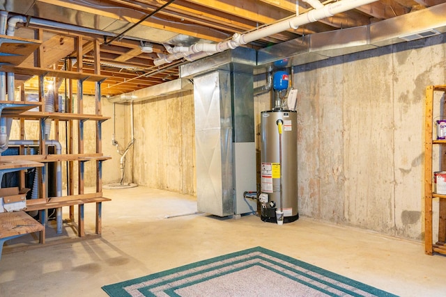 basement with gas water heater and heating unit