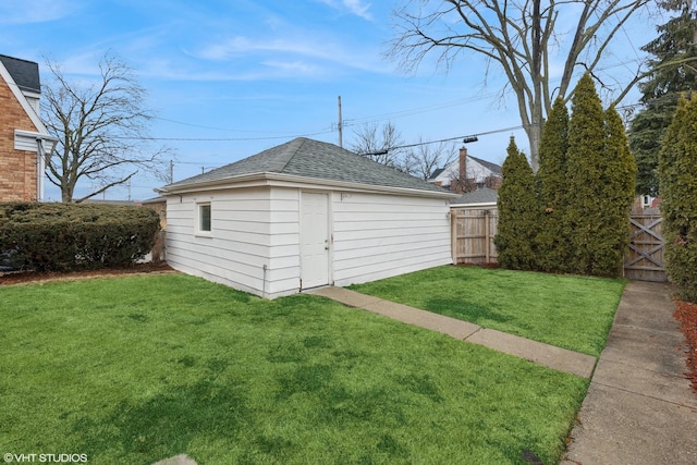 garage with fence