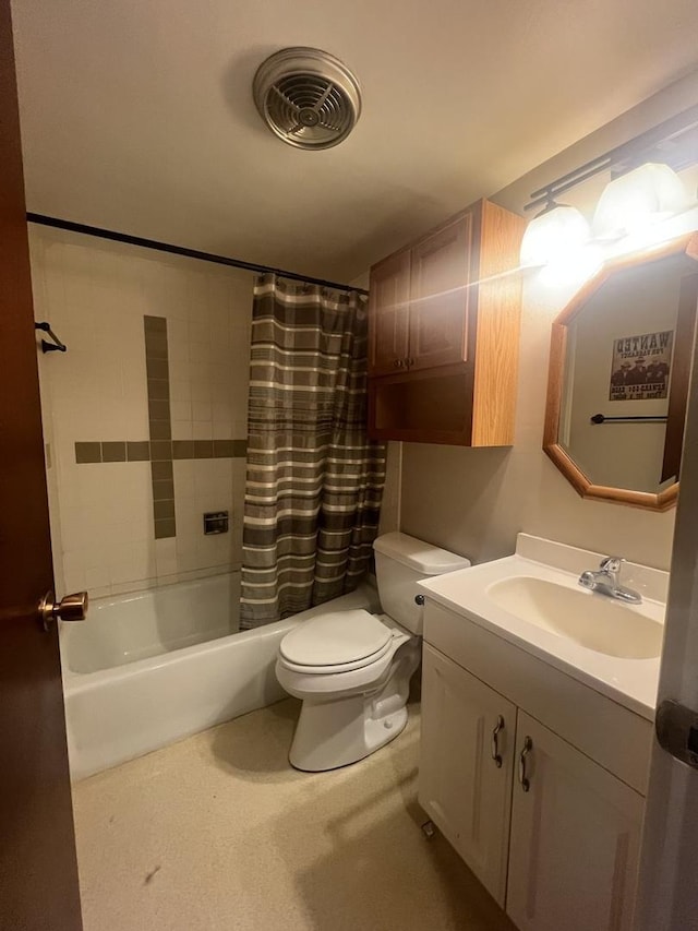 full bathroom featuring vanity, toilet, and shower / bath combo with shower curtain