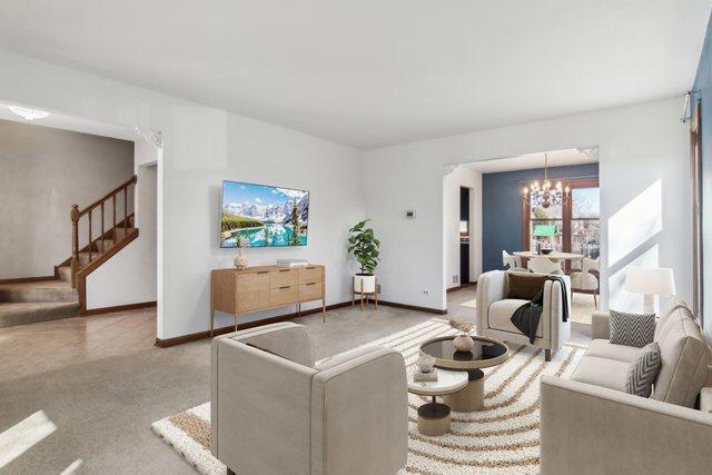 living room featuring a chandelier