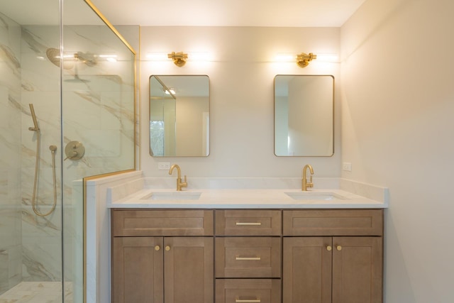 bathroom with a shower with door and vanity