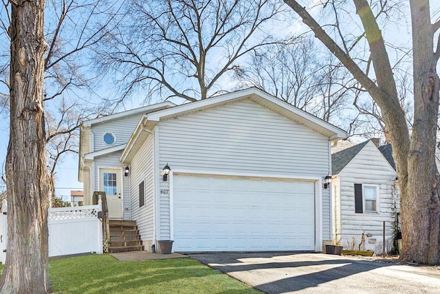 view of side of home with fence