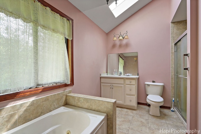 full bathroom featuring a skylight, vaulted ceiling, tile patterned floors, a stall shower, and toilet
