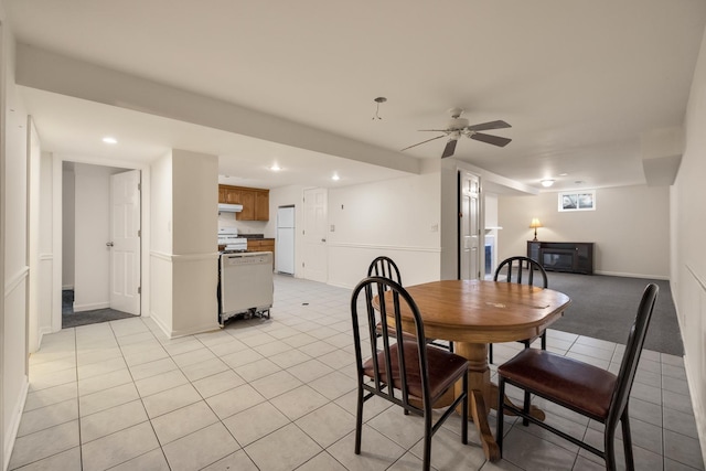 dining room featuring ceiling fan and light tile patterned floors