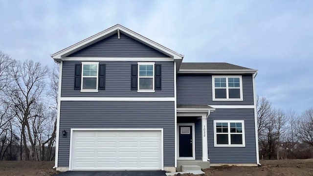 front facade with a garage