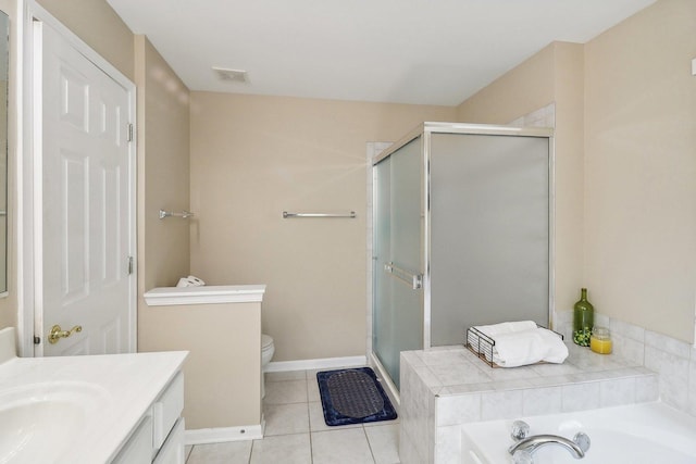 full bathroom featuring tile patterned flooring, vanity, separate shower and tub, and toilet