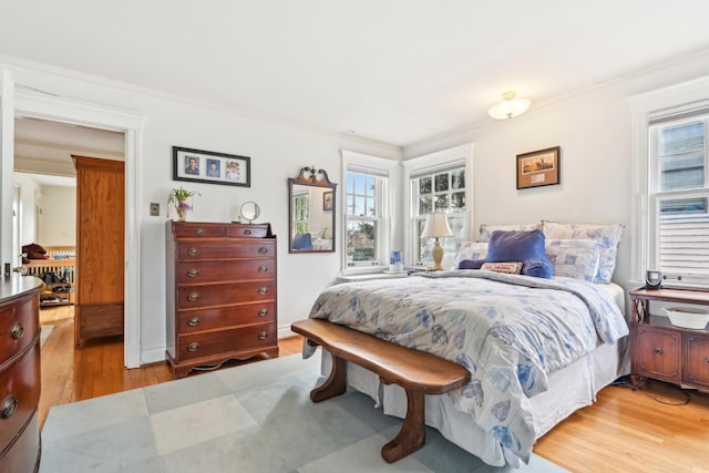 bedroom with wood finished floors